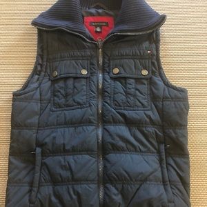 Women’s size small. Navy blue vest.